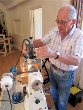 A view of Howard's router jig over the lathe